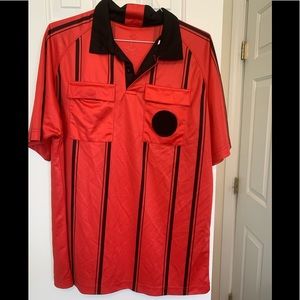 Two soccer referee jerseys